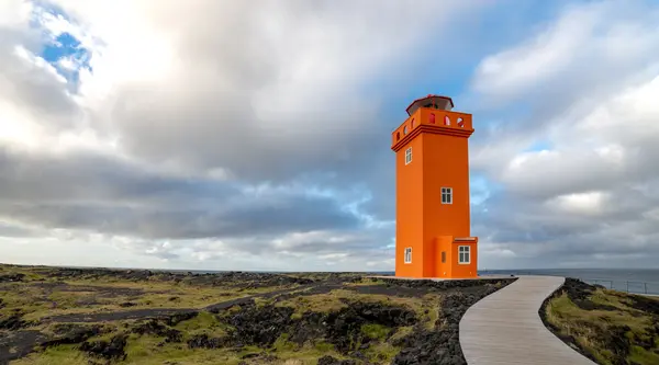 Svörtuloft lighthouse on black basalt cliffs at Öndverðarnes, Snæfellsnes